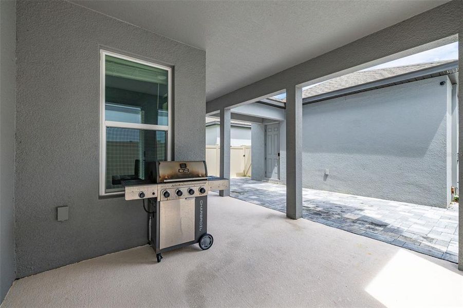 Exterior details and patio area of a home in Highland Ridge, Winter Garden (Image 26).