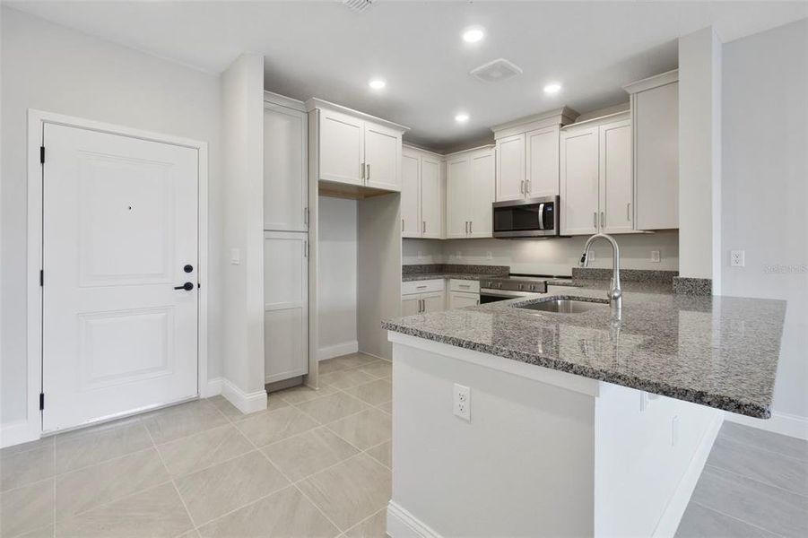 Furnished interior view inside a new home in Gatherings® of Lake Nona, Orlando (Image 10).
