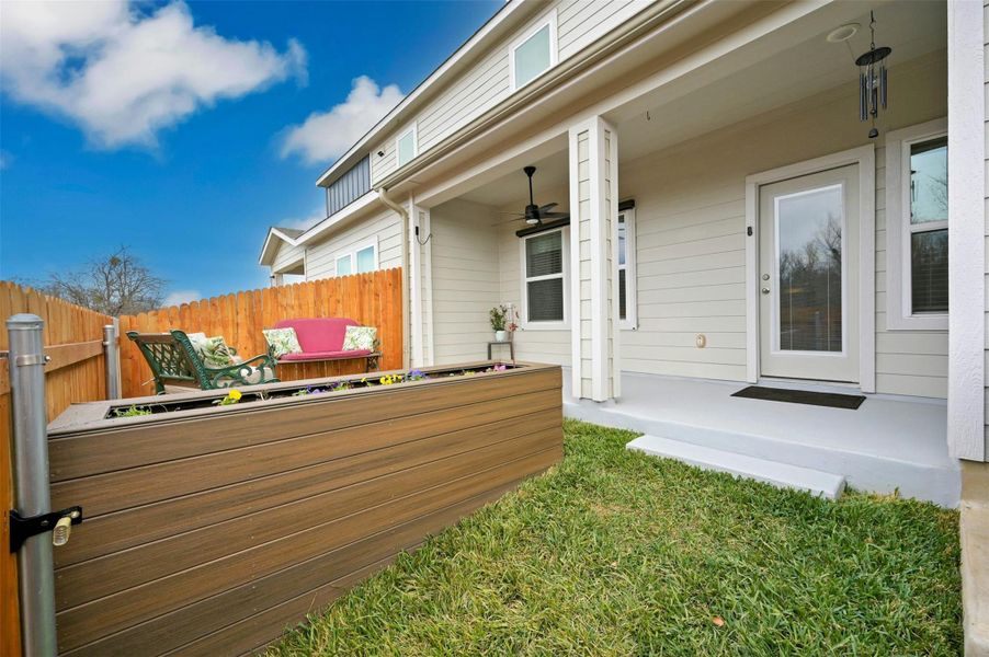 Exterior space featuring ceiling fan