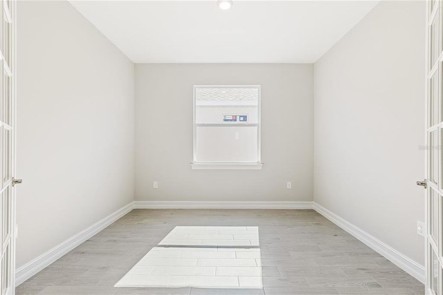 Spacious, unfurnished interior of a new home in Coral Lakes - Tradition & Express, Punta Gorda (Image 14).