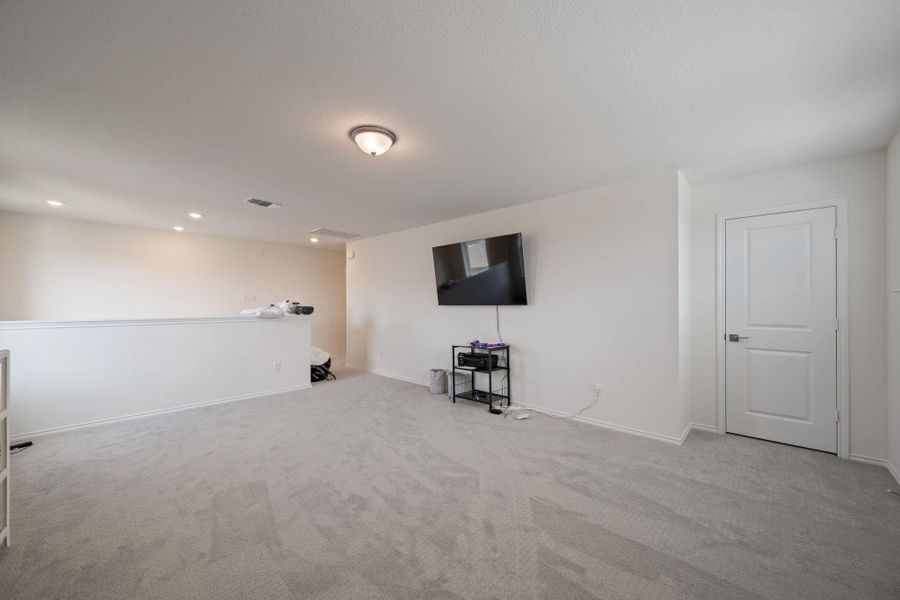 Basement with carpet and recessed lighting Basement with carpet and recessed lighting