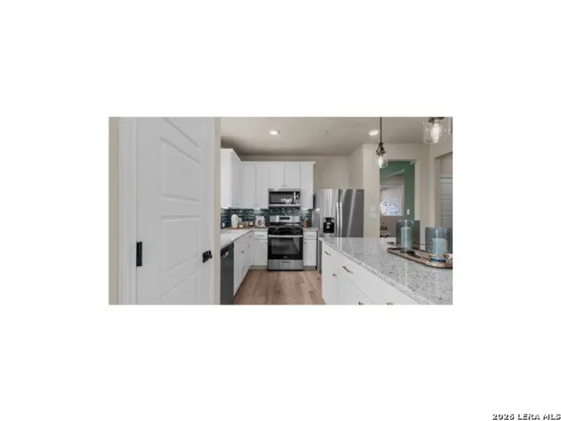 Furnished interior view inside a new home in Hunter's Ranch, San Antonio (Image 10).