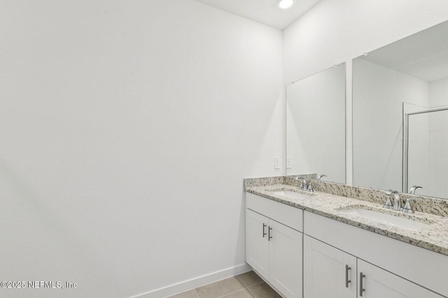 Furnished interior view inside a new home in Lakes at Bella Lago - Signature Series, Green Cove Springs (Image 9). Furnished interior view inside a new home in Lakes at Bella Lago - Signature Series, Green Cove Springs (Image 9).