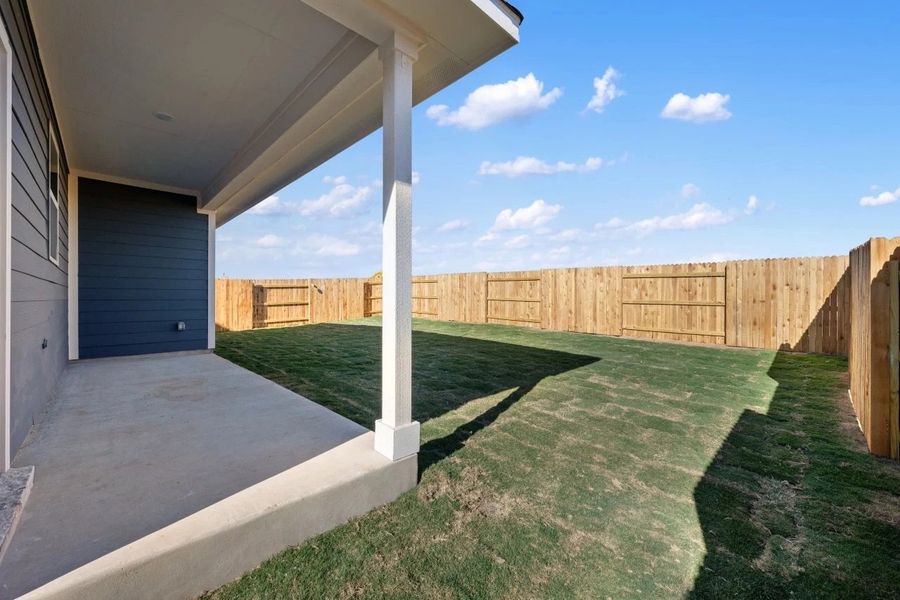 Exterior details and patio area of a home in Patterson Ranch, Georgetown (Image 27).