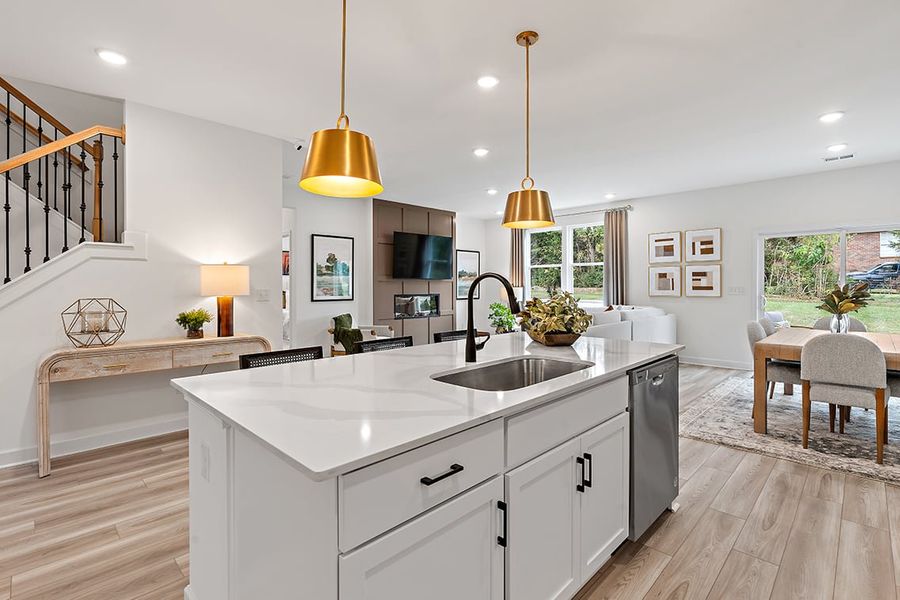 A kitchen with a large island. A kitchen with a large island.