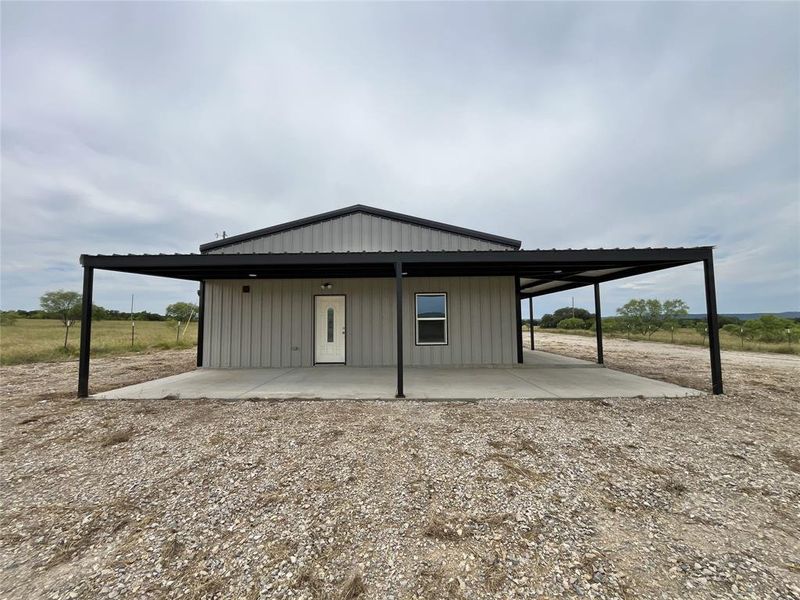Exterior details and patio area of a home in , Mineral Wells (Image 14).