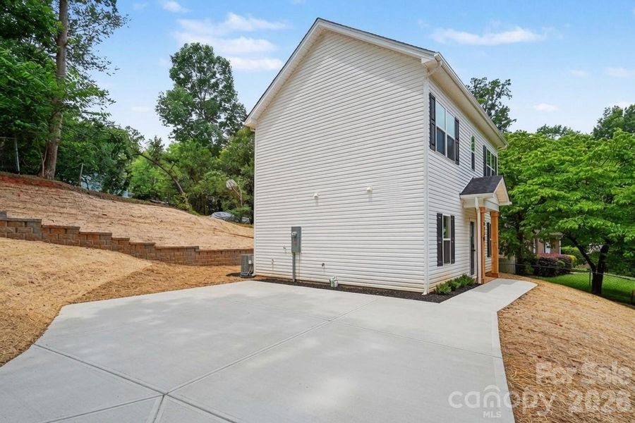 Exterior details and patio area of a home in , Charlotte (Image 16).