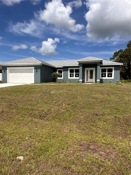Front exterior of a new home in , Palm Bay, FL, highlighting curb appeal (Image 23). Front exterior of a new home in , Palm Bay, FL, highlighting curb appeal (Image 23).