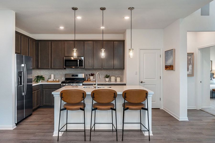 Representative furnished interior of a home built from the Jasmine by Taylor Morrison in Turner's Crossing 45s, Buda (Image 11).