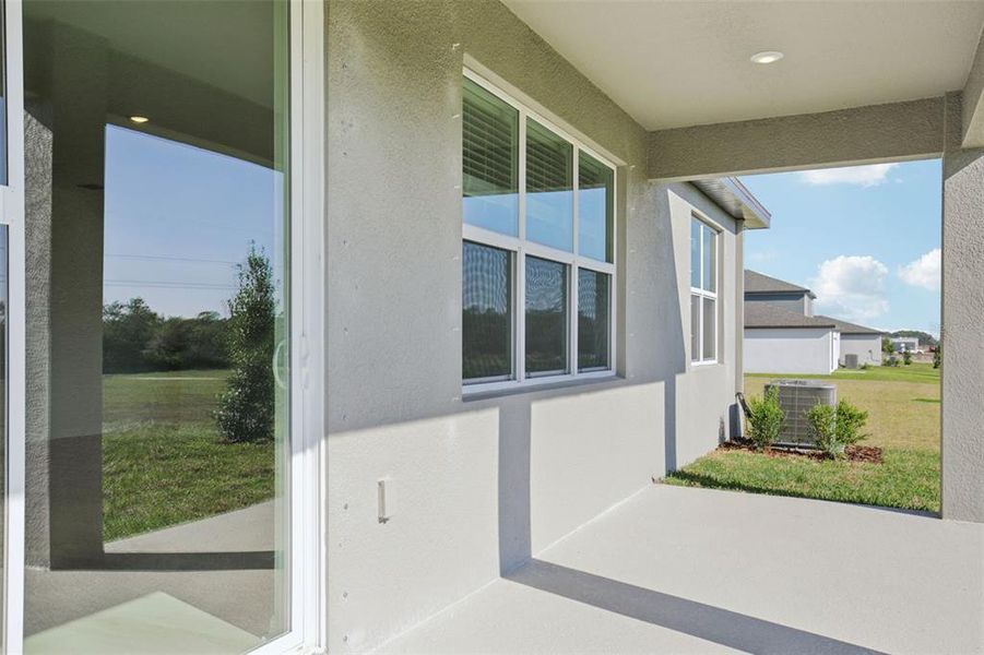 Exterior details and patio area of a home in Coasterra - Reserve Series, Palmetto (Image 25).