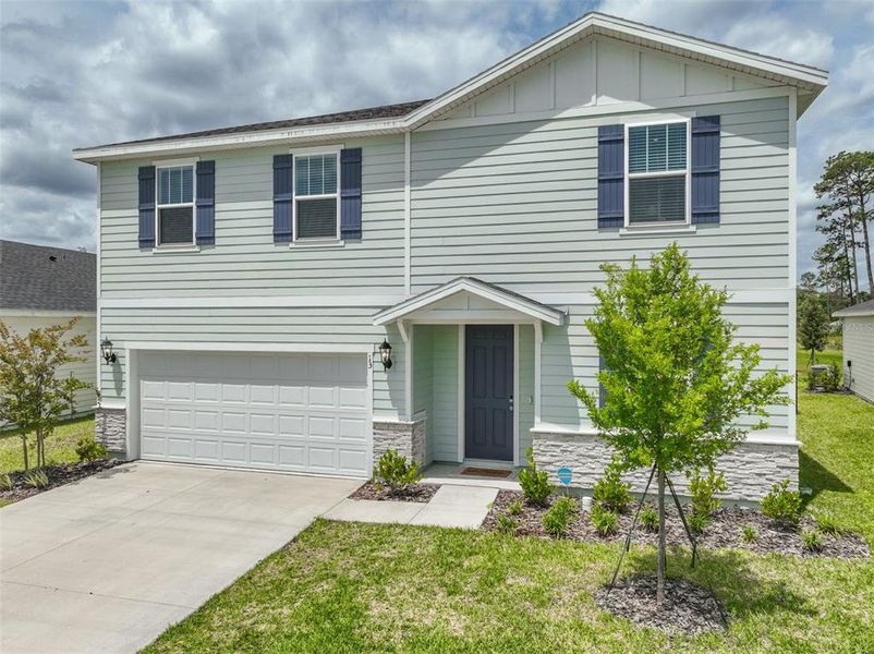 Front exterior of a new home in , Palm Coast, FL, highlighting curb appeal (Image 29). Front exterior of a new home in , Palm Coast, FL, highlighting curb appeal (Image 29).
