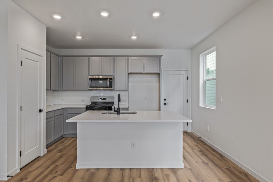 Furnished interior view inside a new home in Painted Prairie, Aurora (Image 7).