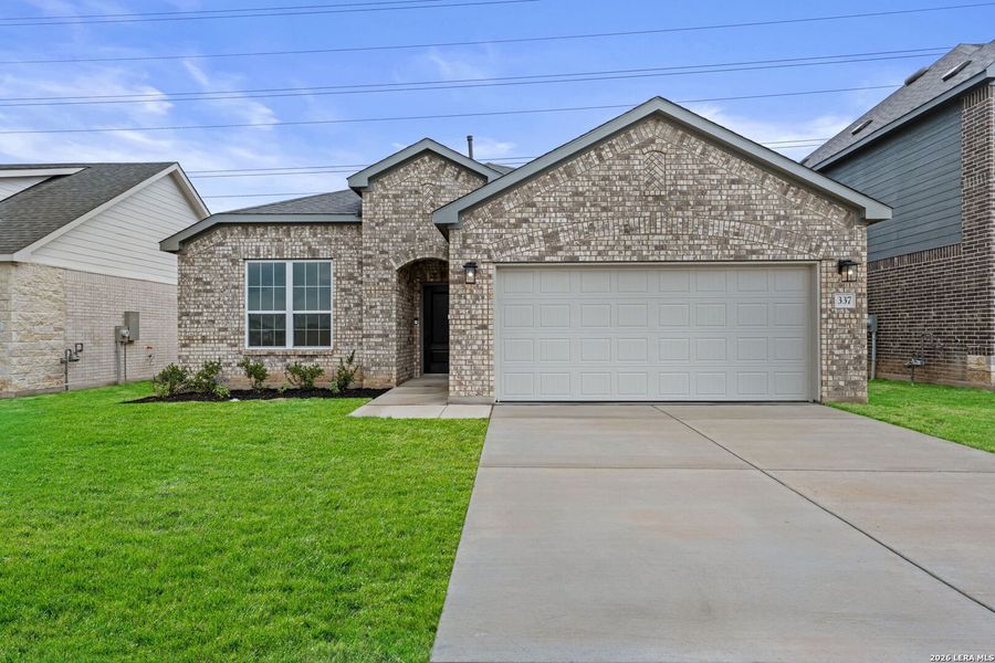 Front exterior of a new home in Nopal Valley, San Antonio, TX, highlighting curb appeal (Image 1). Front exterior of a new home in Nopal Valley, San Antonio, TX, highlighting curb appeal (Image 1).
