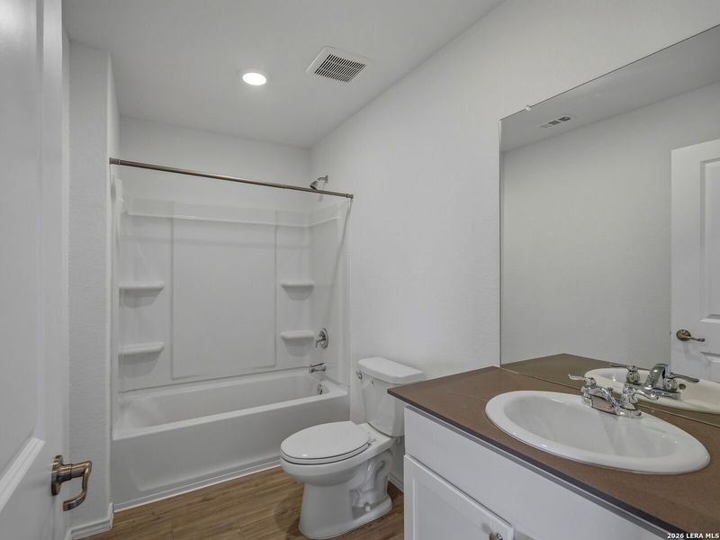 Furnished interior view inside a new home in Mission del Lago, San Antonio (Image 8).