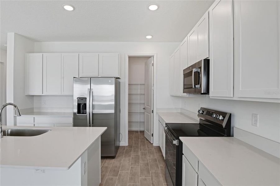 Furnished interior view inside a new home in Seasons at Bella Vista, Dundee (Image 8).