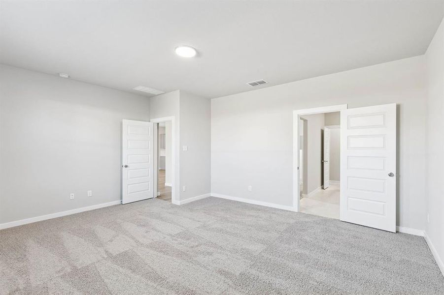 Primary Suite in the Haylee home plan by Trophy Signature Homes - REPRESENTATIVE PHOTO