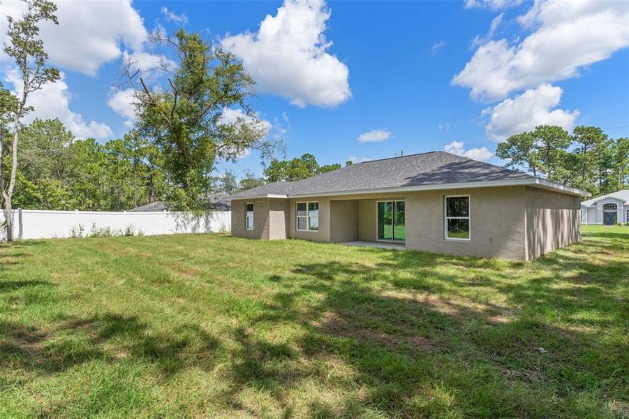 Front exterior of a new home in , Citrus Springs, FL, highlighting curb appeal (Image 24).