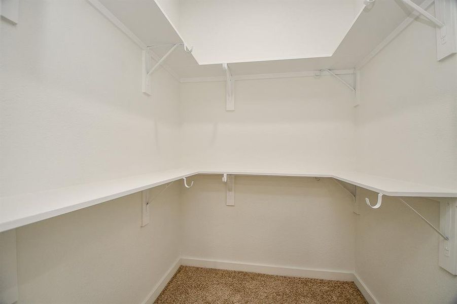 View of the ample closet space of the secondary bedroom.