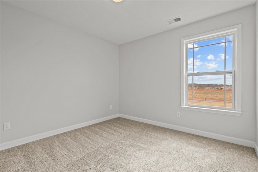 Representative unfurnished interior of a home built from the Ellison by Enchanted Homes in Hampshire Heights, Moore (Image 25).