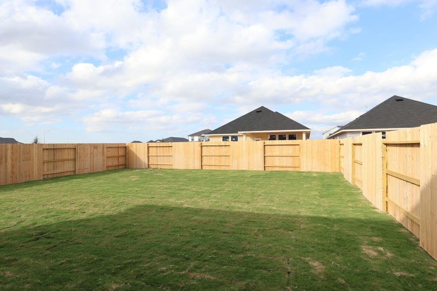 Exterior details and patio area of a home in The Cove at Mason Woods, Cypress (Image 3).