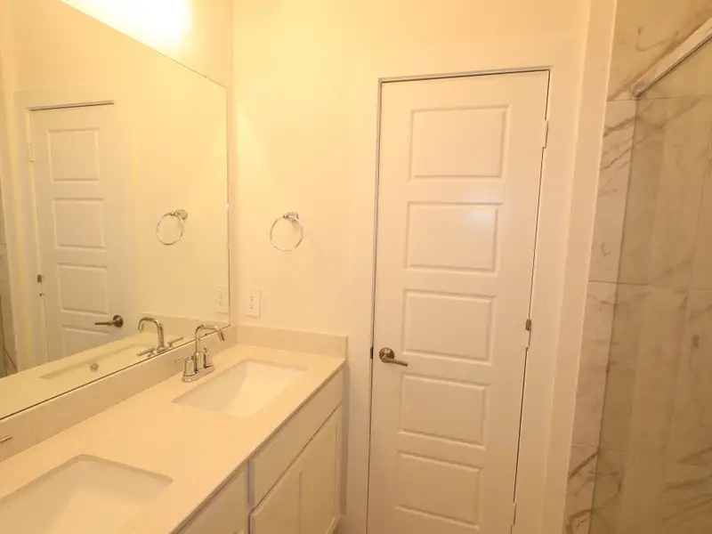 Furnished interior view inside a new home in Sorella, Tomball (Image 7).