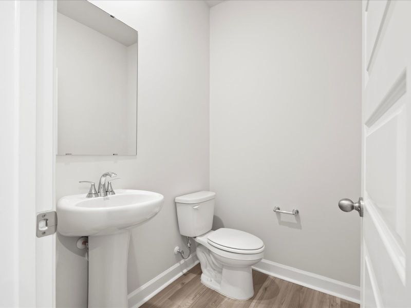 Furnished interior view inside a new home in The Farm at Wells Creek - Signature Collection, Gray Court (Image 10).