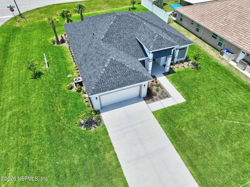 Front exterior of a new home in , Palm Coast, FL, highlighting curb appeal (Image 29).