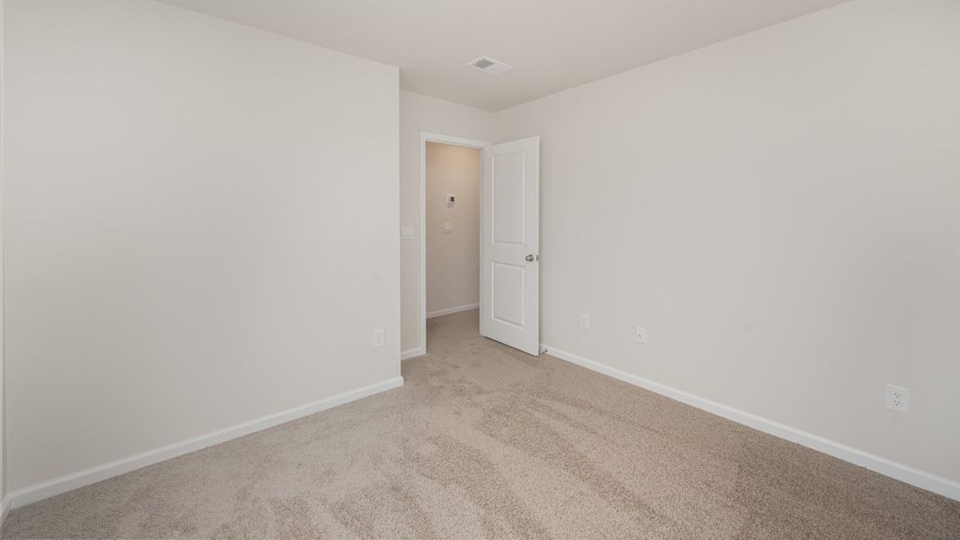 Representative unfurnished interior of a home built from the WREN by D.R. Horton in Sidbury Station, Castle Hayne (Image 24).
