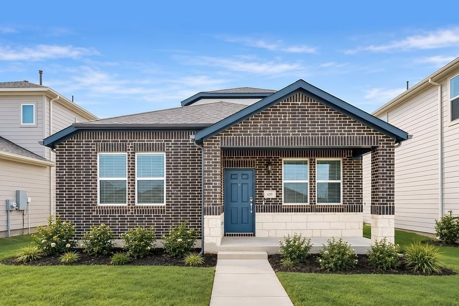 Front exterior of a new home in Emory Crossing, Hutto, TX, highlighting curb appeal (Image 1). Front exterior of a new home in Emory Crossing, Hutto, TX, highlighting curb appeal (Image 1).