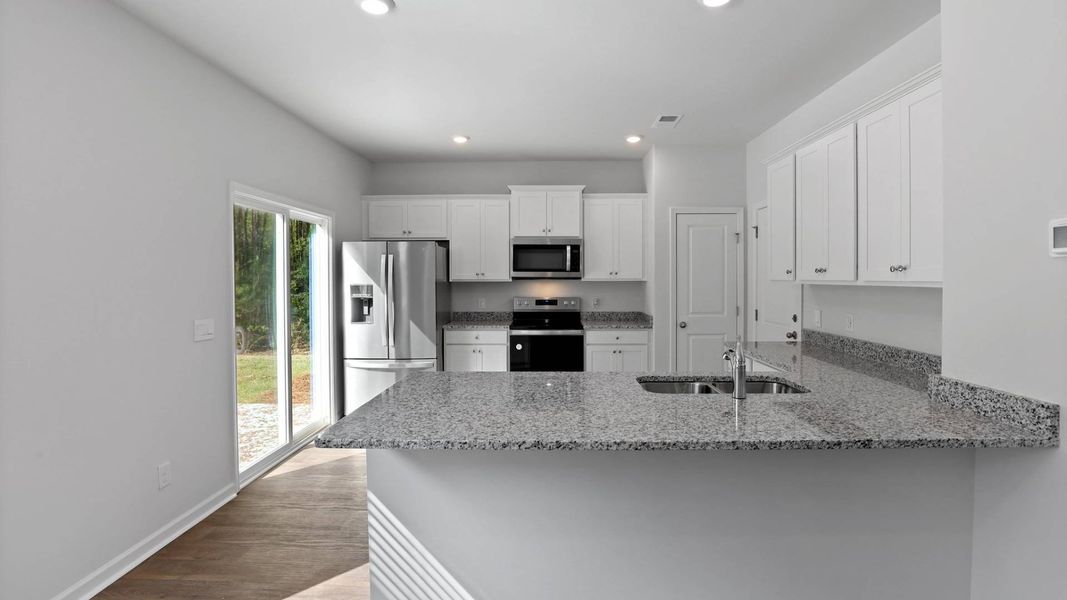 Representative furnished interior of a home built from the BRANDON by D.R. Horton in Rivers Reach, Yemassee (Image 5).