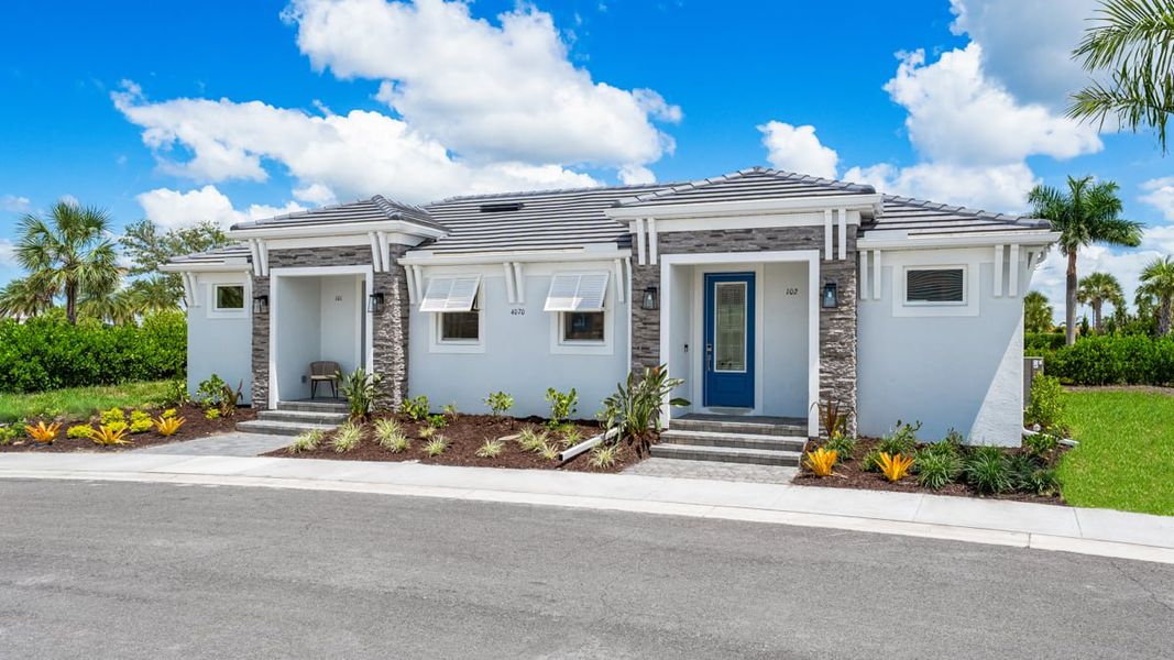Representative exterior photo of a completed home built from the Verona by Taylor Morrison in Esplanade at Azario Lakewood Ranch, Lakewood Ranch, FL (Image 14).