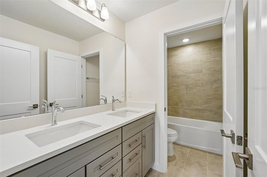 Furnished interior view inside a new home in Grasslands West, Lakeland (Image 14).