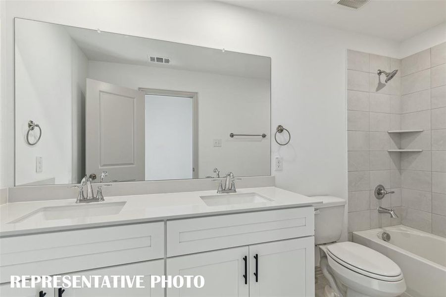 Friends and family will feel right at home in this beautiful guest bath!  REPRESENTATIVE PHOTO