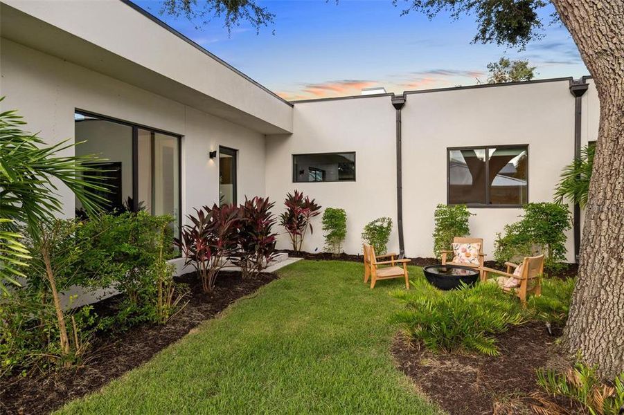 Front exterior of a new home in , Sarasota, FL, highlighting curb appeal (Image 2).