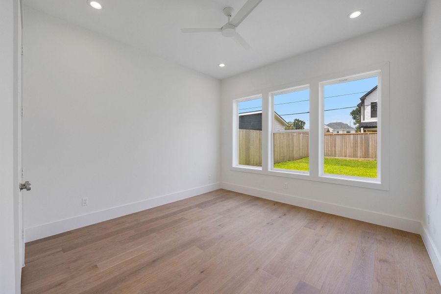 A rare first-floor guest suite offers privacy and convenience. This room could serve many purposes. A rare first-floor guest suite offers privacy and convenience. This room could serve many purposes.