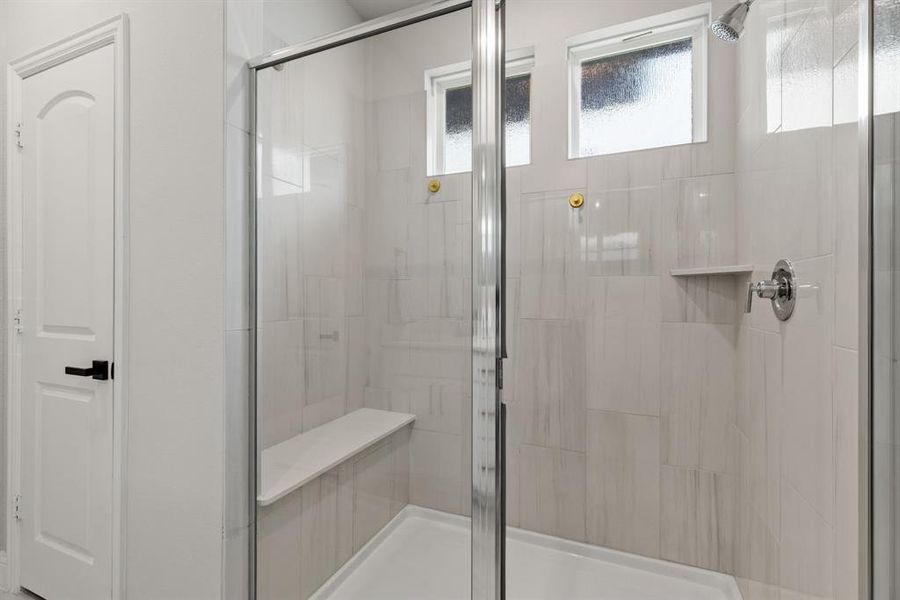 Bathroom featuring a stall shower