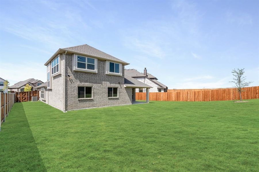 Front exterior of a new home in Willow Wood Classic 50, McKinney, TX, highlighting curb appeal (Image 25). Front exterior of a new home in Willow Wood Classic 50, McKinney, TX, highlighting curb appeal (Image 25).