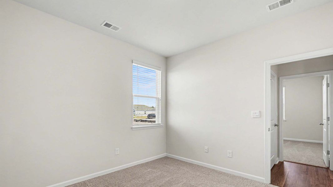 Spacious, unfurnished interior of a new home in Auberon Woods, Conway (Image 10).