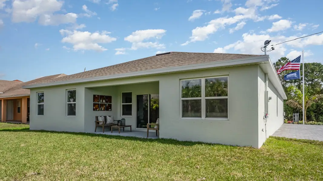 Representative exterior photo of a completed home built from the Madison by D.R. Horton in Port St. Lucie Spot Lots, Port St. Lucie, FL (Image 20).