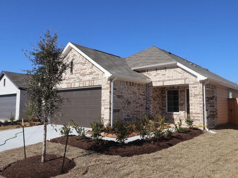 Front exterior of a new home in Indian Springs, Crosby, TX, highlighting curb appeal (Image 20).