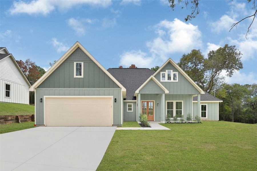Front exterior of a new home in , Plantersville, TX, highlighting curb appeal (Image 1). Front exterior of a new home in , Plantersville, TX, highlighting curb appeal (Image 1).