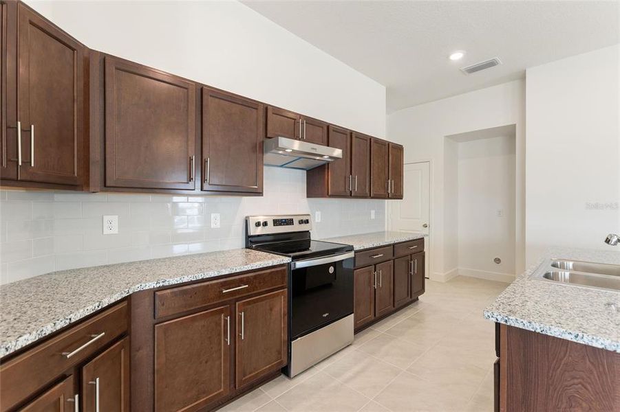 Furnished interior view inside a new home in , Davenport (Image 8).