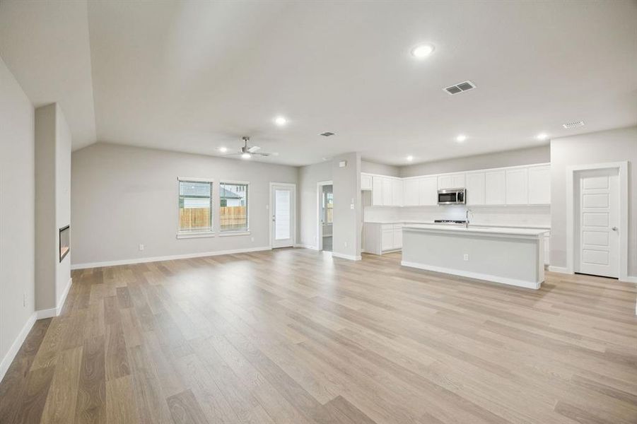 Living Room in the Oscar home plan by Trophy Signature Homes – REPRESENTATIVE PHOTO Living Room in the Oscar home plan by Trophy Signature Homes – REPRESENTATIVE PHOTO