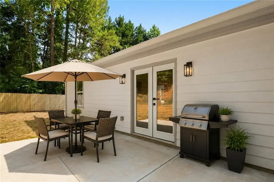 Exterior details and patio area of a home in , Loganville (Image 4). Exterior details and patio area of a home in , Loganville (Image 4).