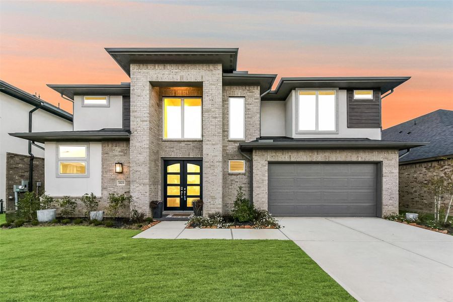 Front exterior of a new home in Avalon at Friendswood, Friendswood, TX, highlighting curb appeal (Image 26).