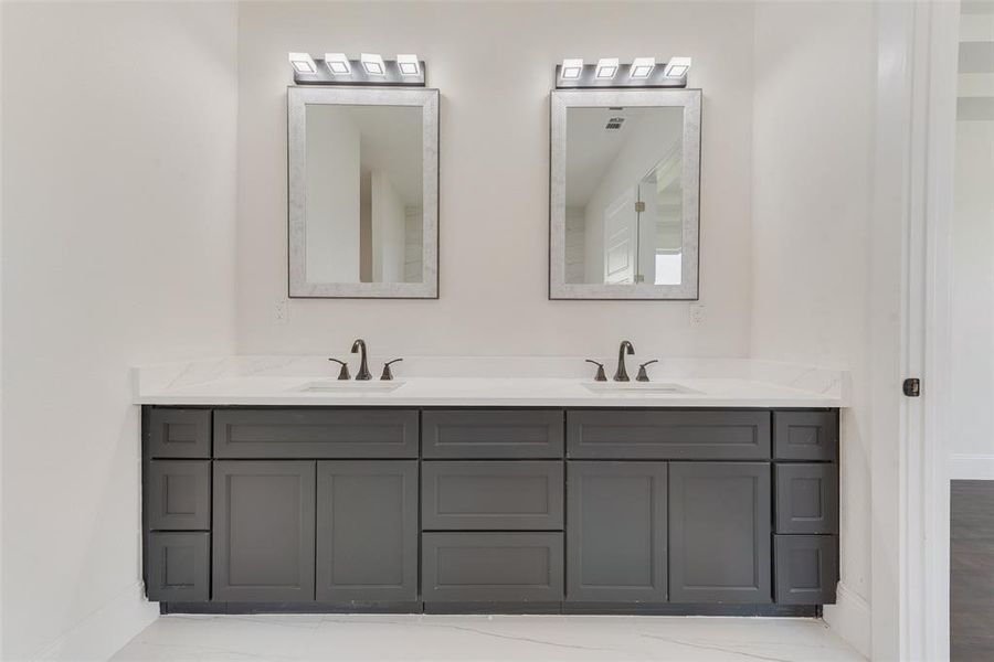 Bathroom featuring vanity