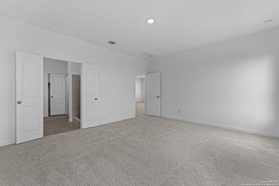 Spacious, unfurnished interior of a new home in Waterwheel: Coastline Collection, San Antonio (Image 13).