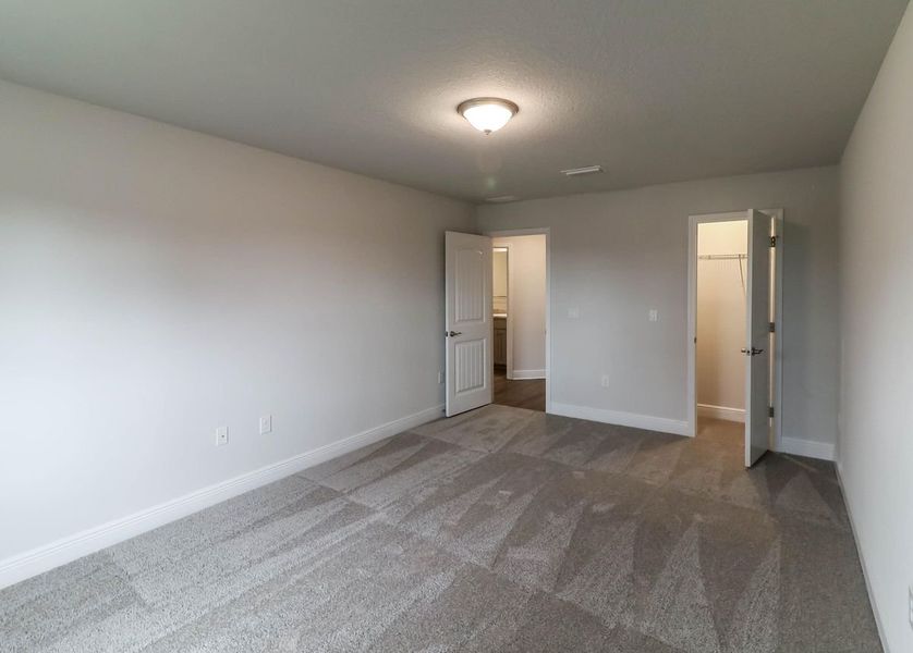 Representative unfurnished interior of a home built from the Plan 3044 by Adams Homes in Cedar Creek at Deerpoint Lake, Panama City (Image 19).