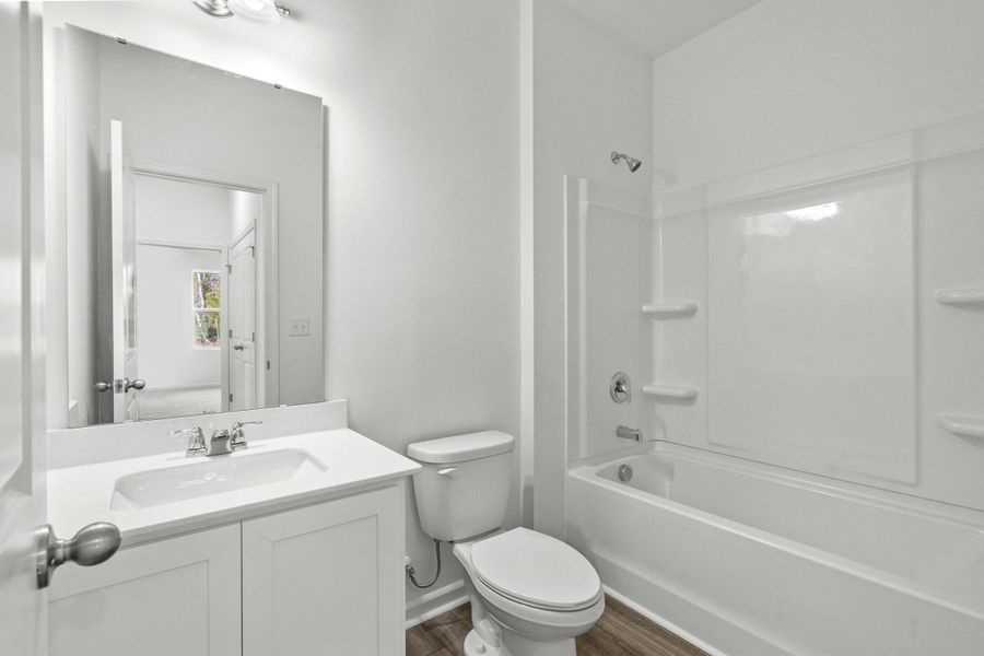 Furnished interior view inside a new home in Pender Woods at Cane Bay, Summerville (Image 4).