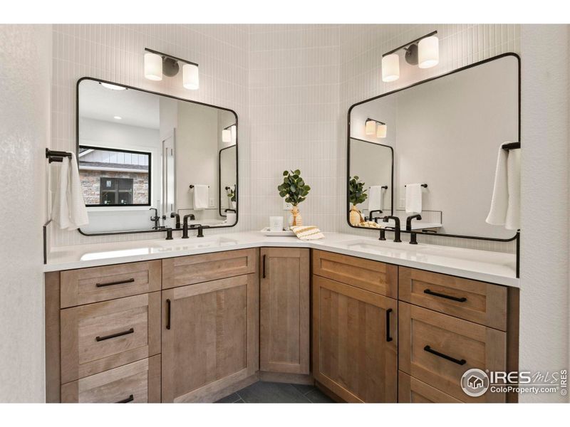 Spacious bathroom with double vanity design